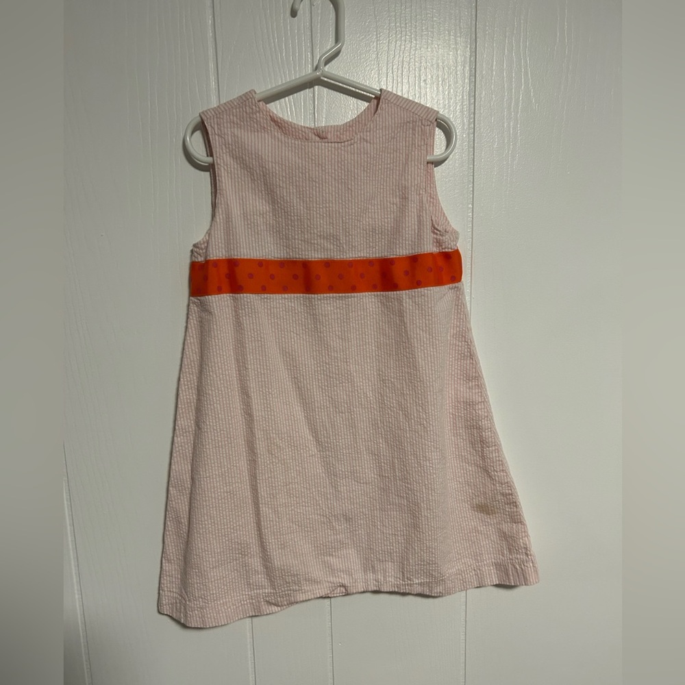 Tiny Bubbles pink seersucker dress with orange ribbon waist, size 6.